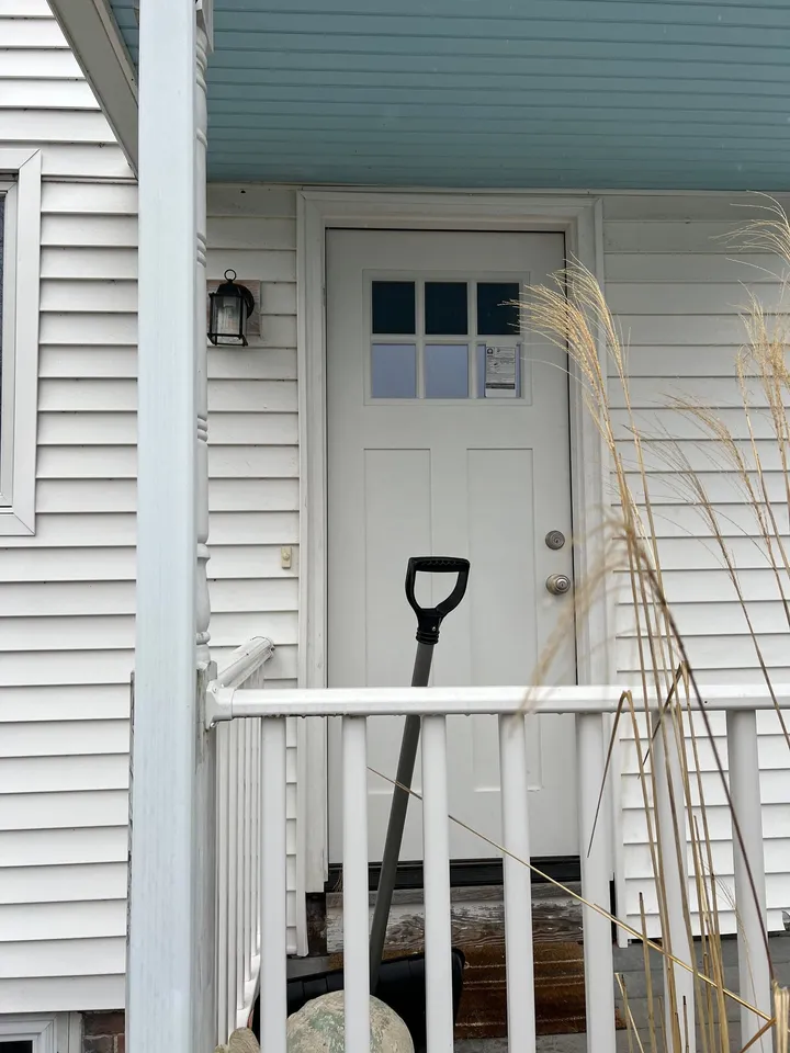 Exterior door and side window on a residential deck