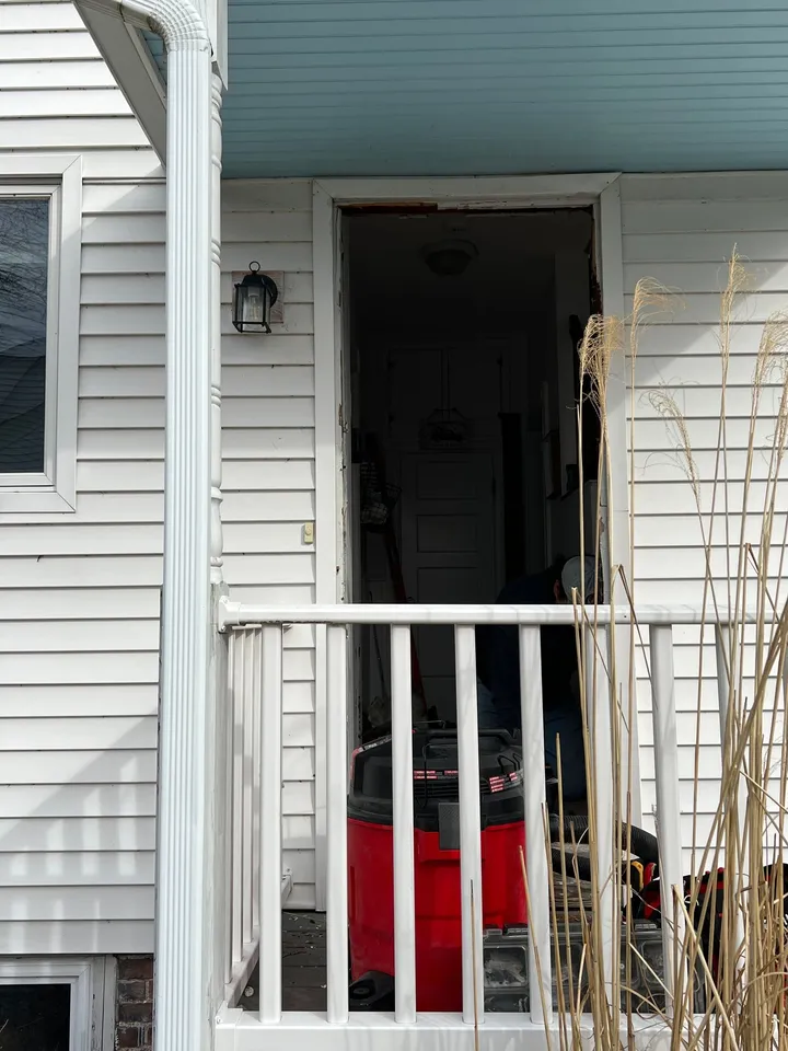 Porch doorway prepared for a new exterior door