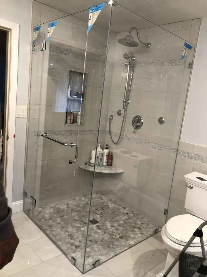 Glass shower enclosure in a remodelled bathroom