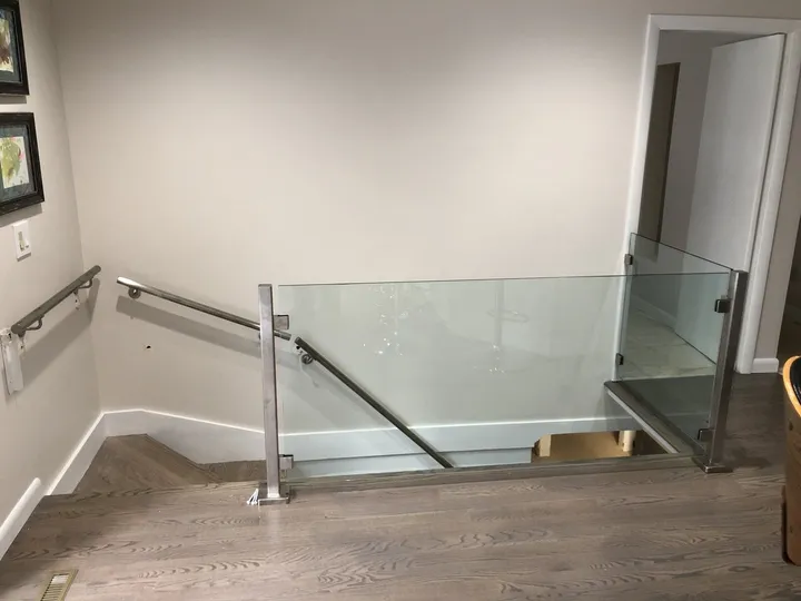 Glass railing panels installed indoors