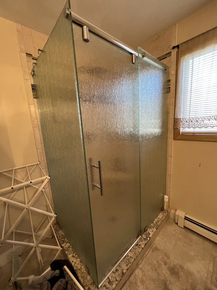 Textured privacy glass shower door