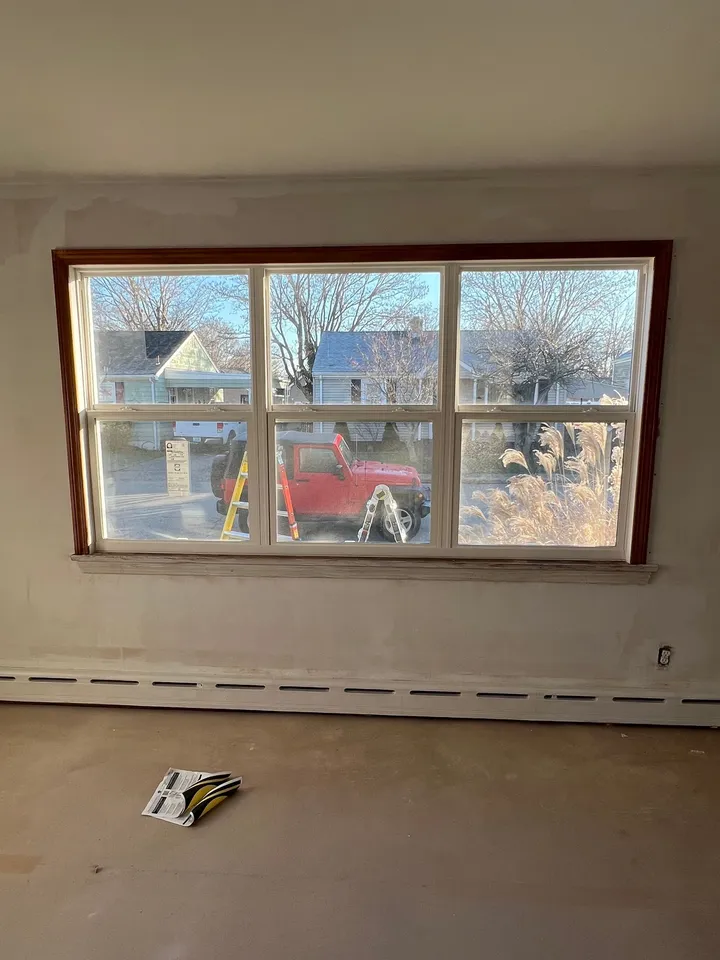 Wood-framed window replaced by J.S Glazing LLC